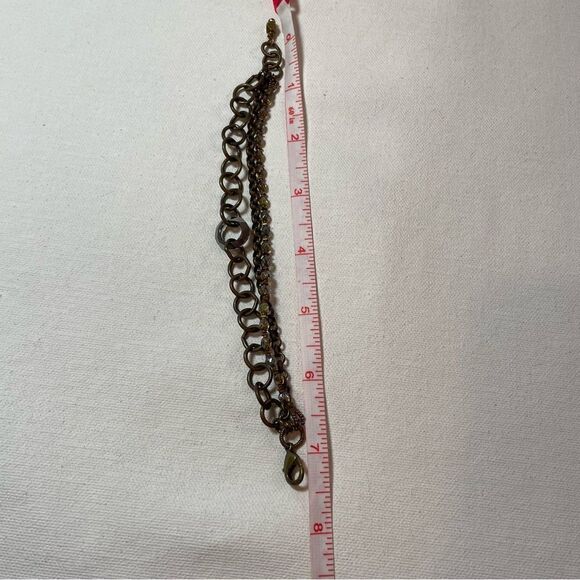 Earthy brass and Czech Crystal & Swarovski ring triple strand bracelet - Picture 3 of 7